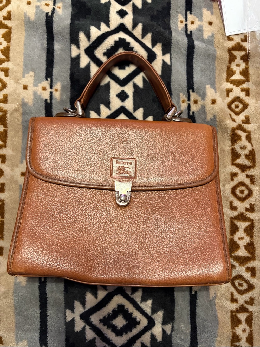 Burberry’s Vintage Top Handle Cognac Pebbled Leather Satchel